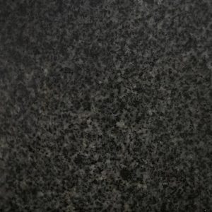 Black granite surface with fine speckled patterns.